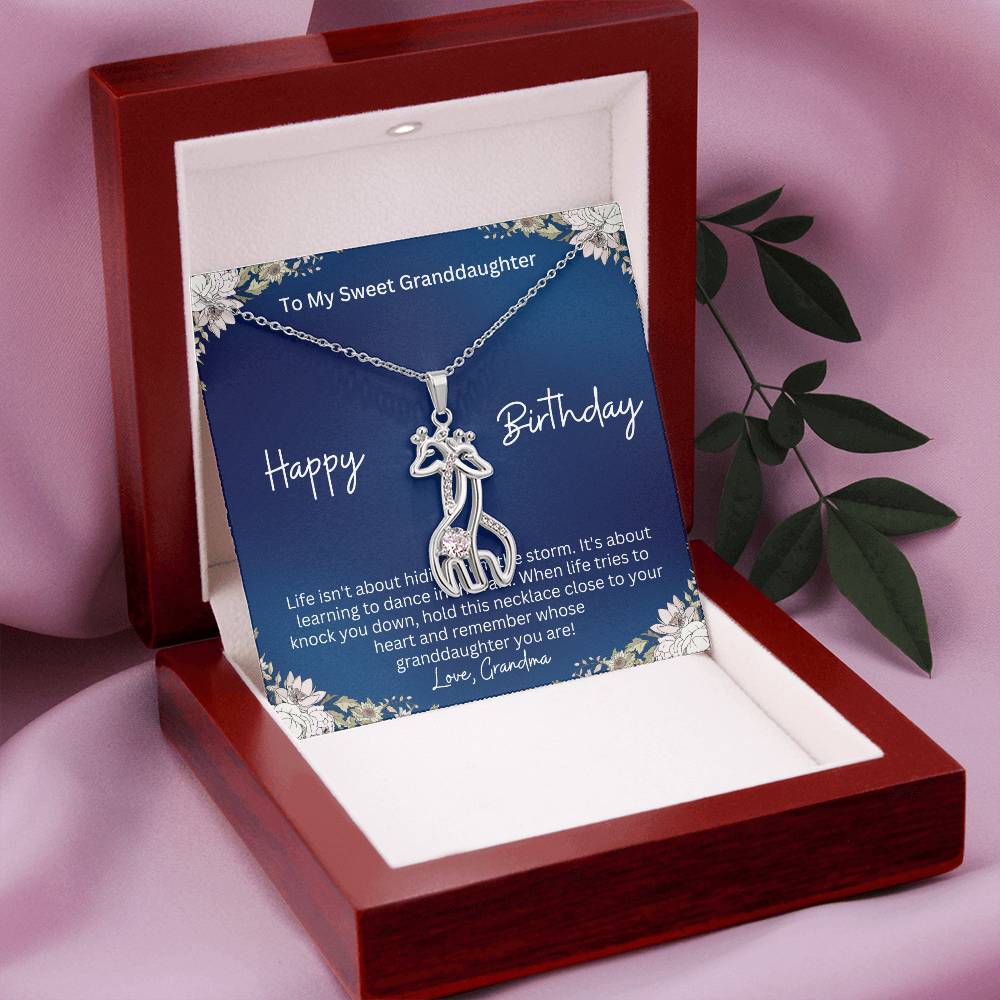 stainless steel necklace with birthday wishes from grandma to granddaughter in a mahogany style jewelry box